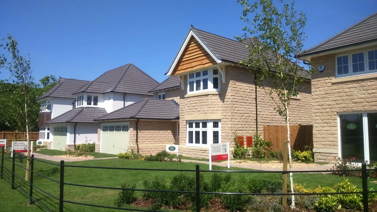 Houses featuring windows and doors supplied by our client, a window and doors supplier